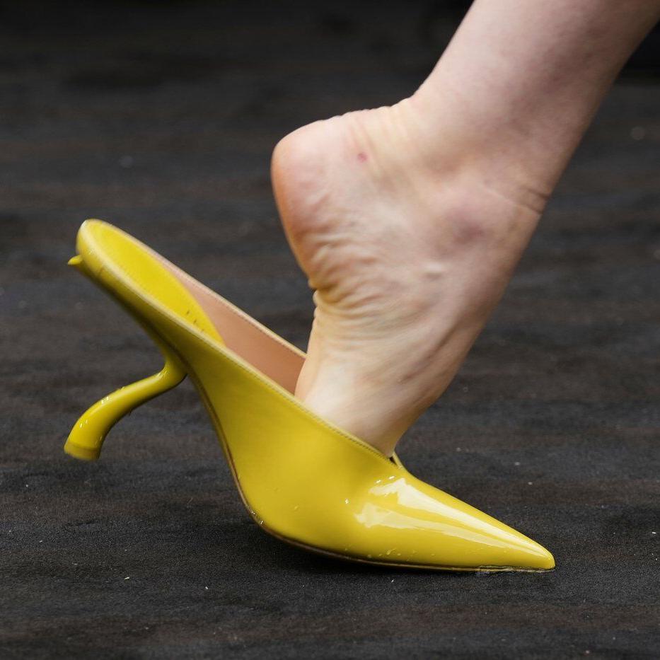 Ferragamo's chartreuse bags and shoes pop against 1920s- inspired co-ed collection